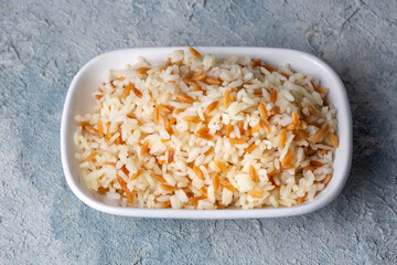 Traditional delicious Turkish food; Turkish style rice pilaf (Turkish name; Arpa sehriyeli pirinc pilavi)