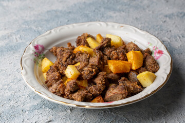Liver pan (Albanian liver) Turkish traditional food. Liver over rice. (Turkish name; arnavut ciger)
