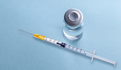Vaccine Flasche und Spritze 