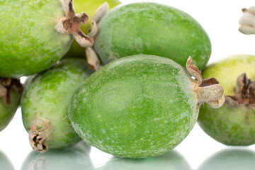 Several ripe sweet feijoa fruits, close-up, isolated on white.