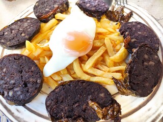 Pantrucu also known as emberzao, an asturian typical sausage with egg and potatoes, Pola de Siero...