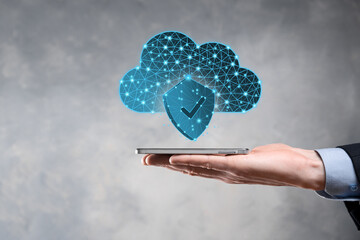 Cloud technology. Polygonal wireframe cloud storage sign with shield with a tick on dark blue....