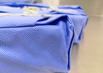Surgical Pack Wrapped With Drape Sheet. Selective Focus