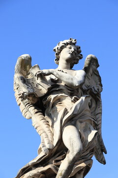 Angel with the Superscription Statue on the Ponte Sant'Angelo Bridge in Rome, Italy