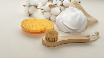 a small wooden eco-brush for facial massage with natural bristles