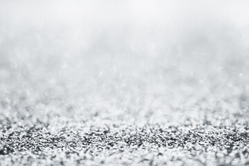 Abstract silver glitter sparkle texture with bokeh background