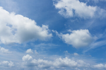 Naklejka na ściany i meble White cloud over the blue sky