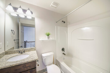 Fototapeta na wymiar Small bathroom interior with shower tub acrylic kit
