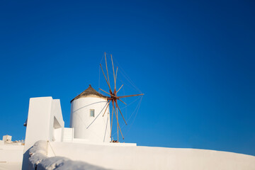 Traditional windmill in Oia on Santorini island, Greece