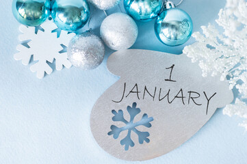 1 January text on a New Year's eve background, festive otkytka