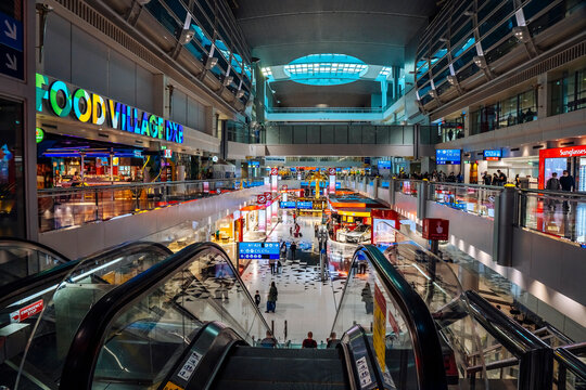 DUBAI, UAE - 06.11.2021: DXB airport interior. Duty free shops on the Dubai International Airport. High quality photo