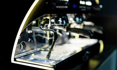 Professional coffee making in cafeteria. Cappuccino machine in coffee shop.