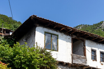 Fototapeta na wymiar Village of Delchevo with authentic houses from the nineteenth century, Bulgaria