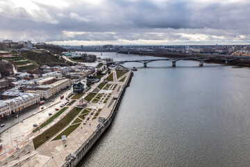 Fototapeta na wymiar a panoramic view from a drone of the old part of the city with the Kremlin of Nizhny Novgorod on a cloudy autumn day 