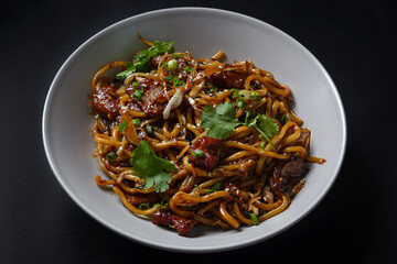 asian noodles on a black background