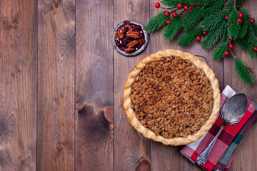 American apple cranberry pie, topped with crumbled dough and pecan, horizontal, top