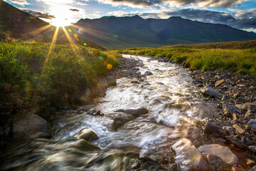 A small creek cascades through the tundra in Gates of the Arctic National Park, Alaska. 