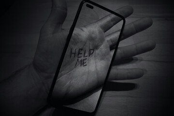 Hand with mobile phone, help me