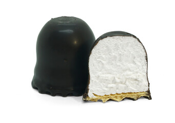 An exquisite cake. Soufflé in chocolate. Isolated on white.