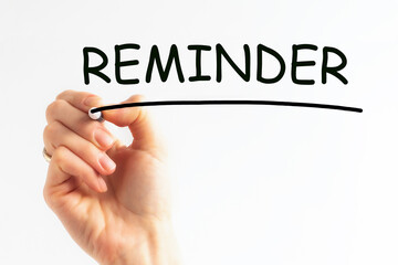 hand writing inscription REMINDER with marker, concept, stock image.