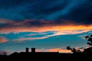 Dramatic sunset sky background with mammatus clouds
