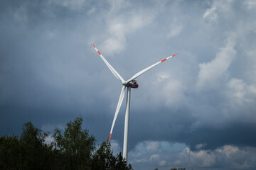 Beautiful cloudy sky with windmill in saarland germany europe