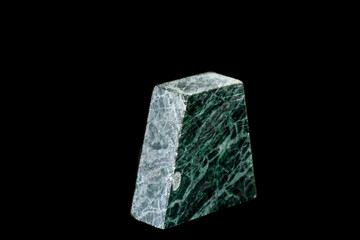 macro stone Serpentinite mineral on black background