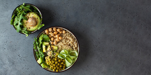 Banner healthy vegetable lunch from the Buddha bowl with quinoa, avocado, chickpeas. Copy space.