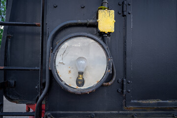 Taillight with bulb from an old black steam locomotive