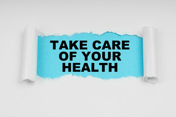 In the middle of a white sheet in space on a blue background the inscription - Take care of your health