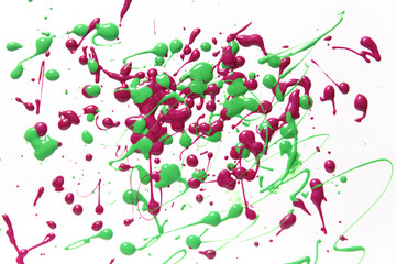 Pink and Green Spilled Nail Polish on White Background