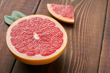 grapefruit on brown background copy space