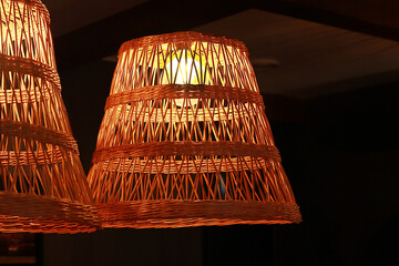 Rustic wicker lamps , close up