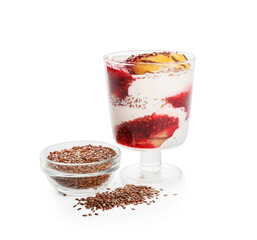 Tasty dessert with flax seeds and yoghurt in glass on white background