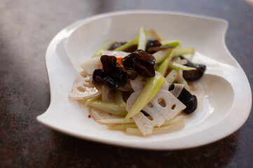 str fried black fungus with lotus root