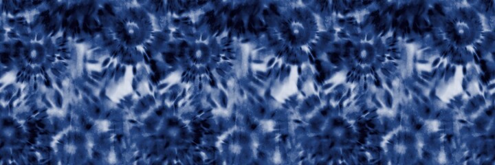Seamless indigo tie dye 1970s funky hippie repeat pattern swatch motif for surface design and print. High quality illustration. Vibrant navy blue apparel material print. Psychedelic textile design.