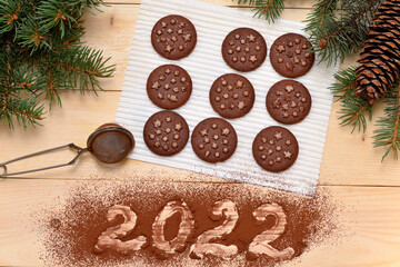 christmas background cooking cookies inscription 2022 flat lay view from above
