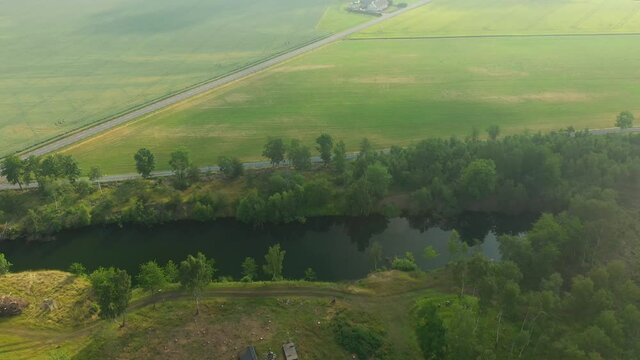 Aerial flying over rural agriculture landscape 