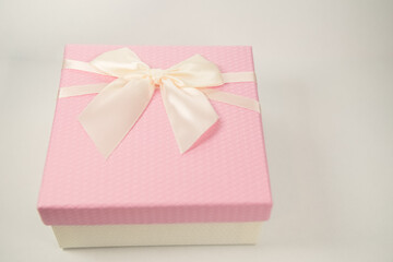 Pink gift box isolated on white background