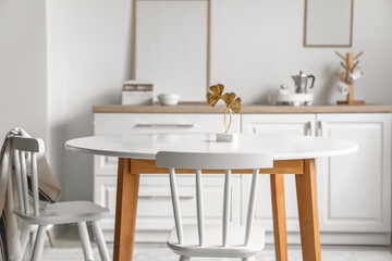 Interior of modern light room with dining table
