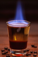 Flamed cocktail of liquor and coffee