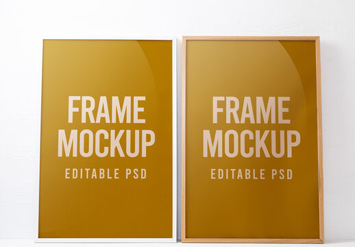 Pair of Frames Against Wall Mockup