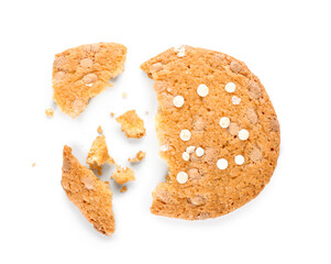 Delicious broken cookie with chocolate chips on white background
