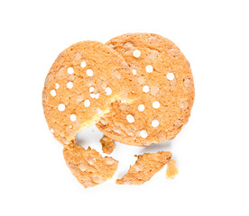Delicious broken cookies with chocolate chips on white background