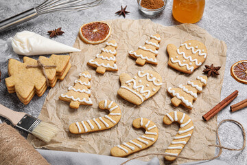 Fototapeta premium Homemade christmas gingerbread cookies with white icing decoration, holiday baking and festive dessert preparation