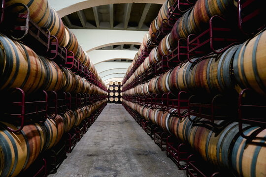Wine is stored in oak casks at the Bodegas Riojanas winery in Cenicero