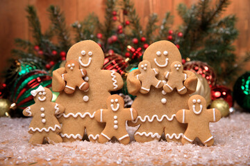 Family of Gingerbreads with 6 kids on Holiday Christmas Background