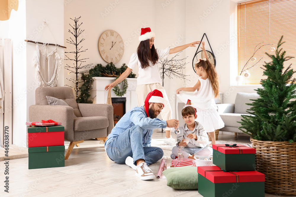 Canvas Prints happy family with cute little children celebrating christmas at home