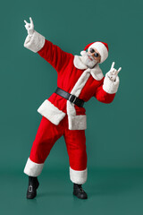 Cool Santa Claus on color background