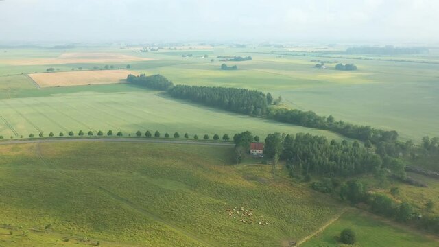 Aerial flying over rural landscape in Osterlen, southern Sweden